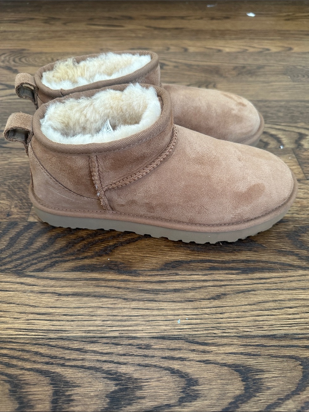UGG Brown Suede Shearling Lined Slip-On Booties
Note: no noticeable smell - Picture 4 of 7